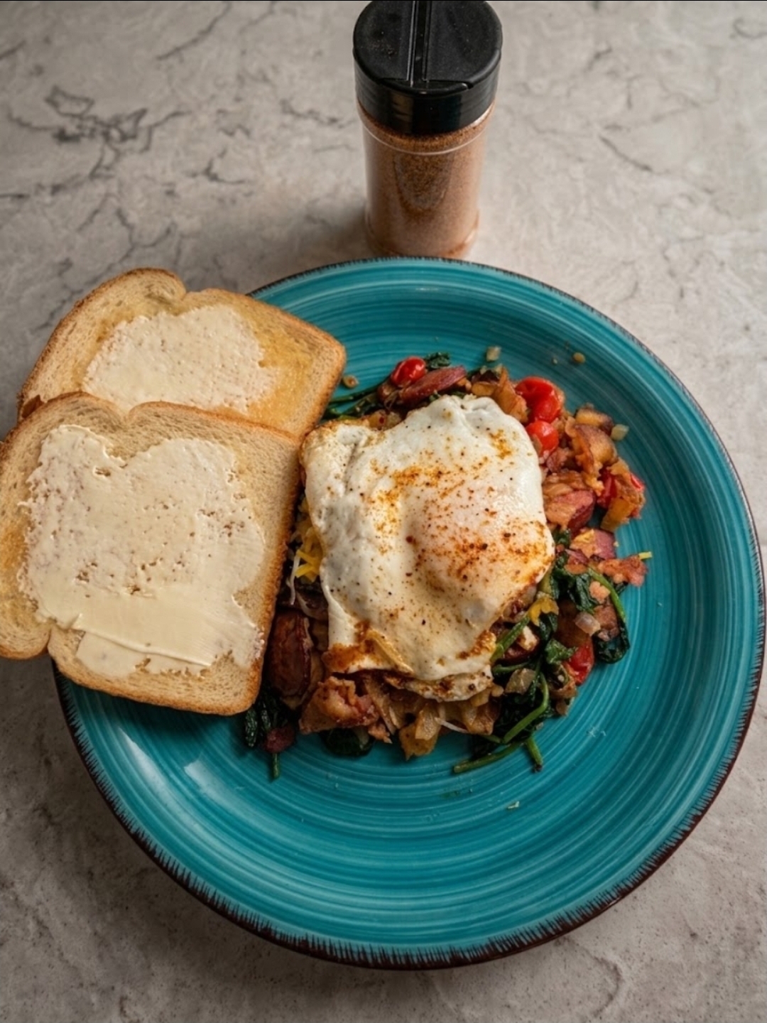 Trucker G Spot Seasoning on a breakfast hash with a fried egg